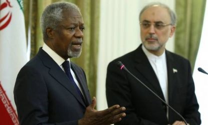 U.N. special envoy Kofi Annan and Iranian Foreign Minister Ali Akbar Salehi hold a joint press conference in Tehran on July 10: Annan is confident that working with Iran will make peace in Sy
