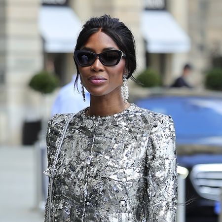 Naomi Campbell wearing a silver metallic Chanel skirt set to the Chanel show at Paris Couture Fashion Week June 2024