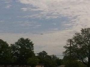 Shuttle Carrier Aircraft and Discovery Seen Distantly from Andrews Air Force Base