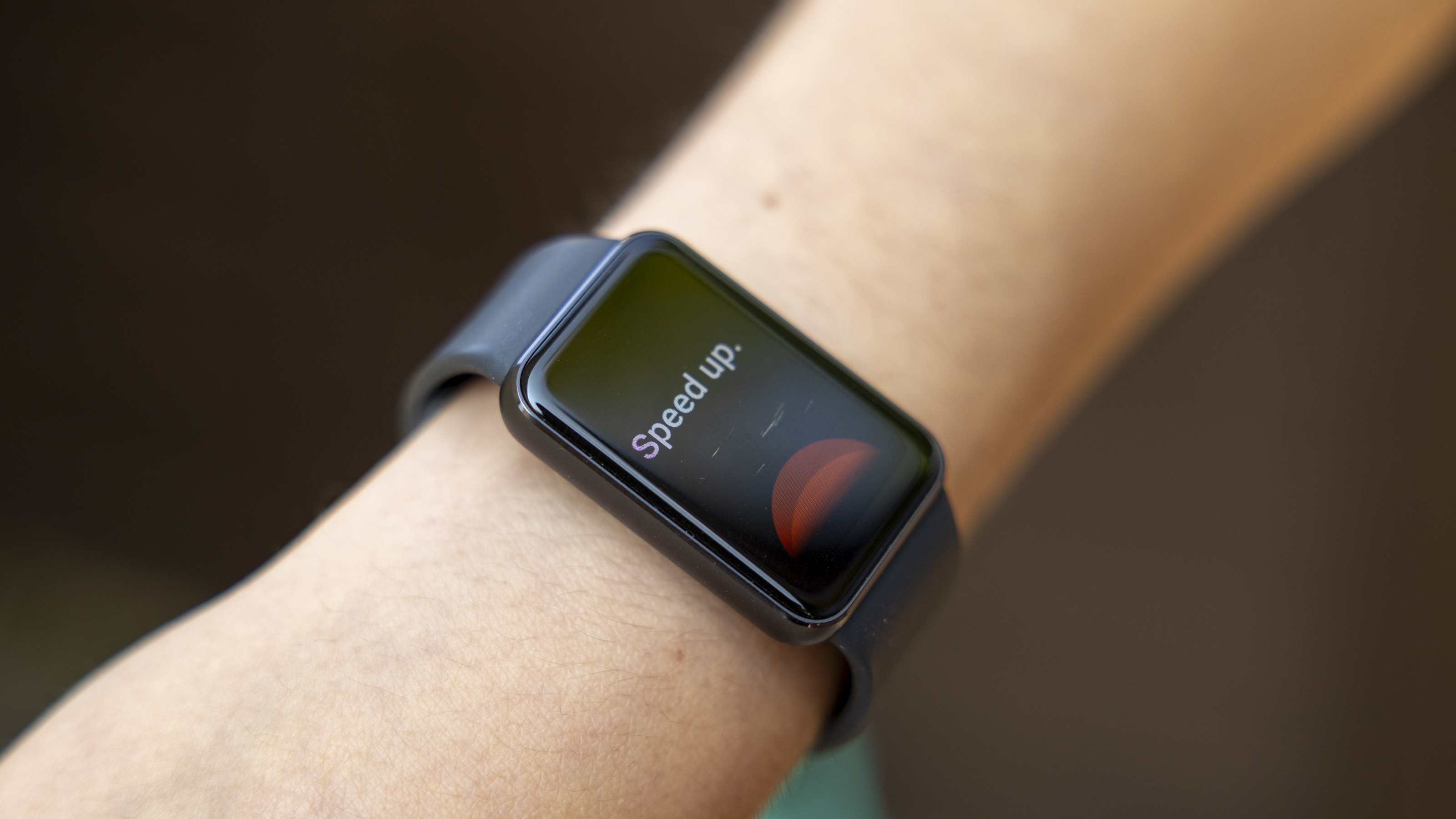 The Samsung Galaxy Fit 3 watch in grey worn on a female wrist