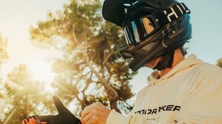 Sergio Layos in Mondraker jersey in full face helmet