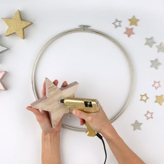 wooden star and embroidery hoop