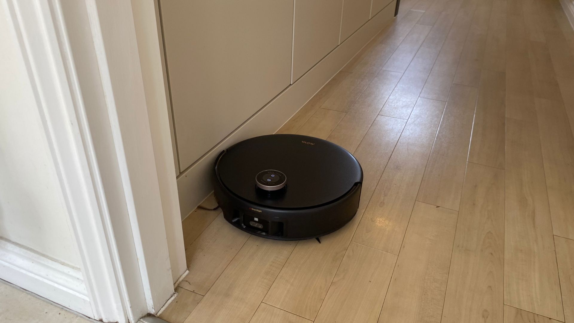 MOVA Z60 Ultra Roller Complete Robot Vacuum working on wooden floors in Carly's home