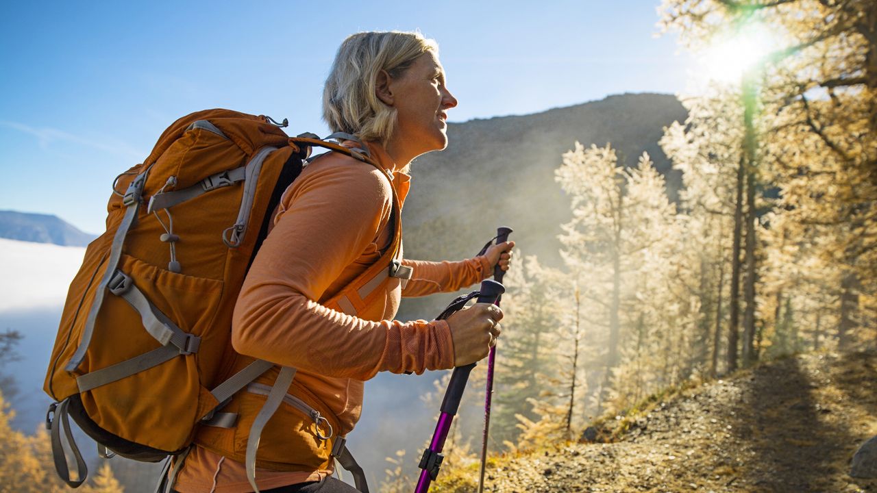 Woman walking with some of the best trekking poles