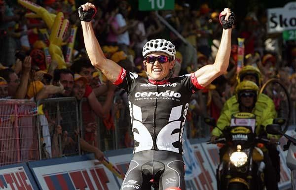 Simon Gerrans (Cervelo) pumps his arms in celebration.
