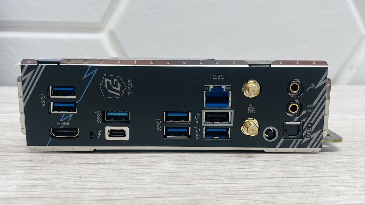 ASRock Phantom Gaming B860I Lightning Wi-Fi motherboard on a desk.