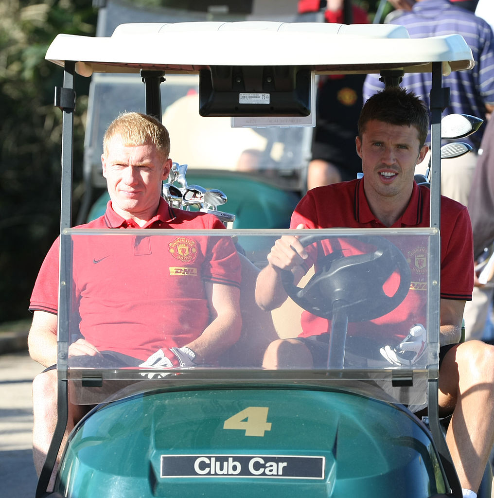 DURBAN, SOUTH AFRICA - JULY 19: (EXCLUSIVE COVERAGE) Paul Scholes (L) and Michael Carrick of Manchester United plays golf during the club&amp;amp;apos;s pre-season tour of South Africa on July 19, 2012 in Durban, South Africa. (Photo by John Peters/Manchester United via Getty Images)