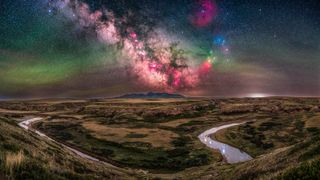 This captures a 180&deg; panorama of the rich and colourful summer Milky Way over the iconic Sweetgrass Hills of Montana, specifically the West Butte. (Photo by: Alan Dyer/VWPics/Universal Images Group via Getty Images)