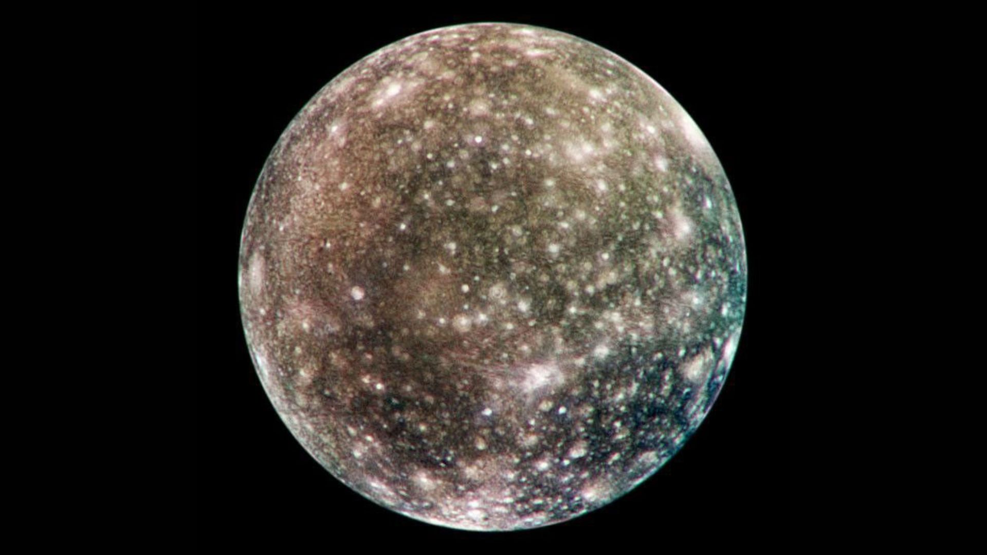 A large rocky moon with various white pockmarks and a gray and blue-green surface glows in the darkness of space