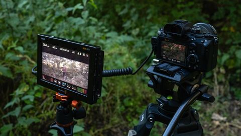 Blackmagic Video Assist 7 12G HDR used outside in a wooded area