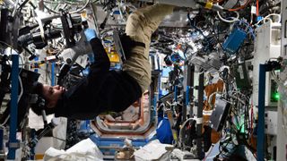 NASA astronaut Jessica Watkins performing experiments on the International Space Station.