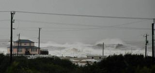 Hurricane Sandy whips up waves in the Atlantic off the coast of Kitty Hawkk, N.C., on Monday, Oct. 29, 2012.