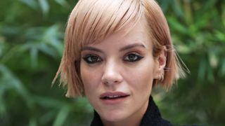 Lily Allen pictured with peachy/rose gold hair