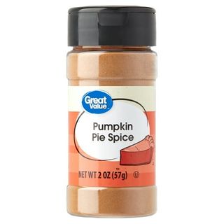 A glass jar of Great Value Pumpkin Pie Spice, 2 Oz with a black lid