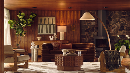 wood-clad living room with lights of low seating and warm lighting