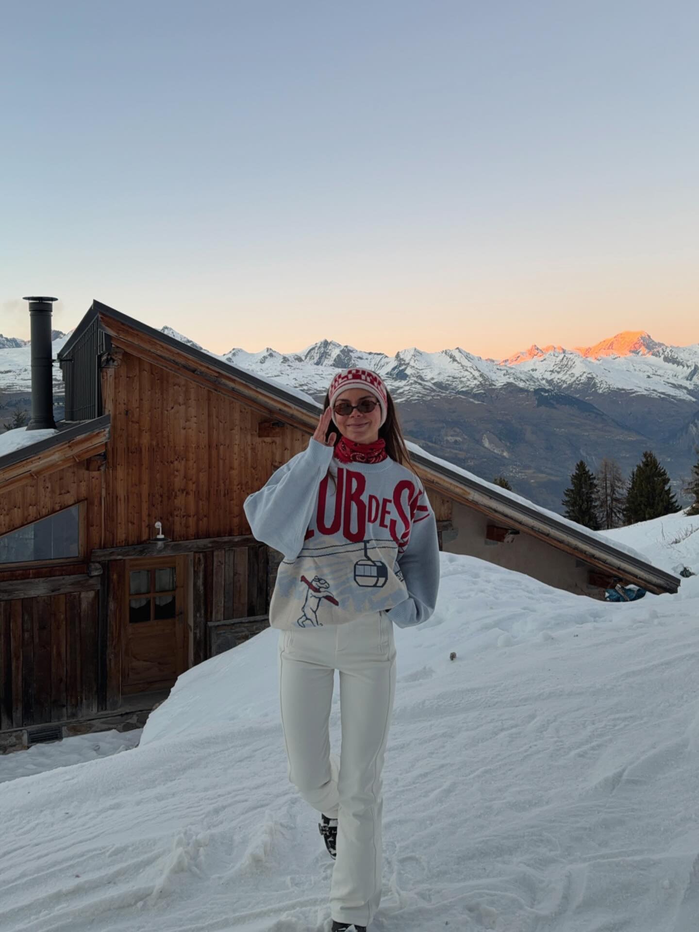 Woman wearing a retro ski sweater.