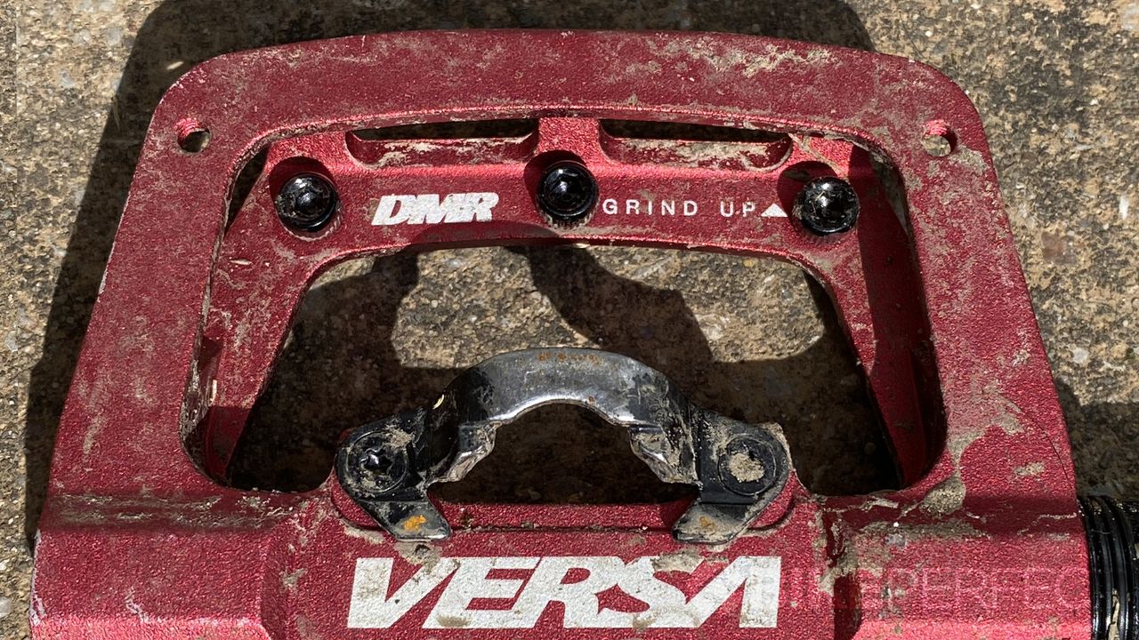 DMR Versa pedal showing the "grind up" etching on the clipless side of the pedal body