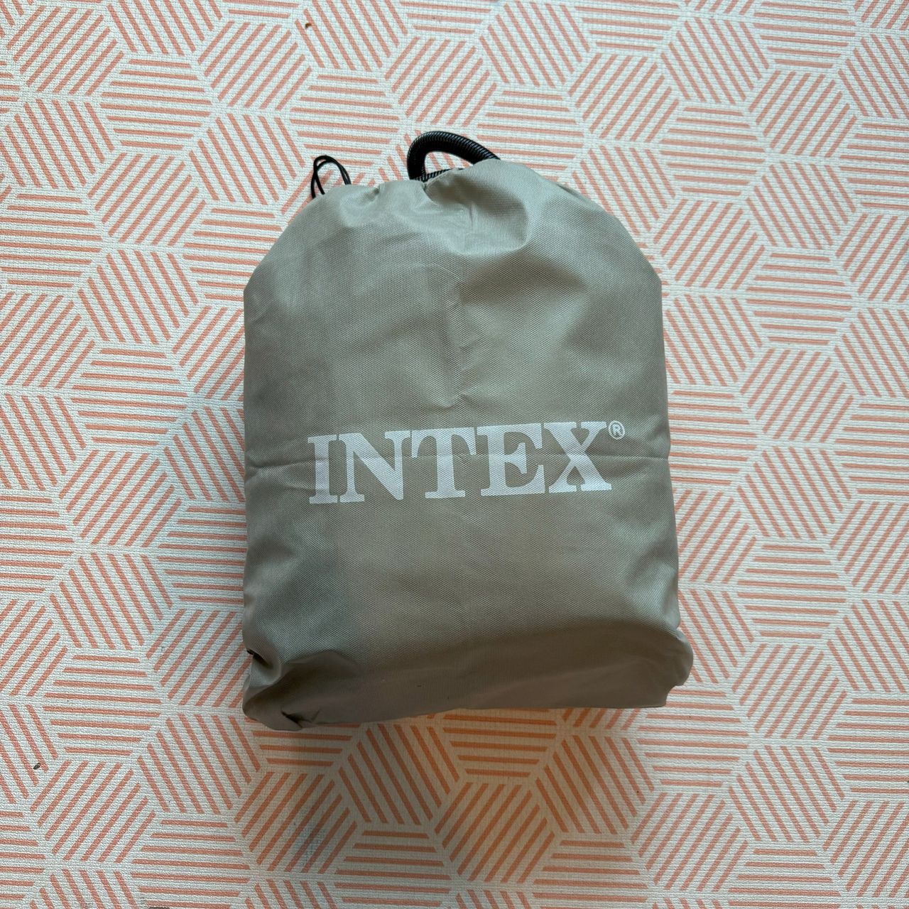 The Intex Kidz Travel Bed with Hand Pump being tested