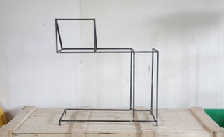 A true vision of architectural furniture for the bed table with their linear steel structure