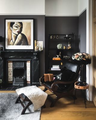 small black living room with black metal storage unit