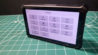 Obsbot Talent review's overview menu on display on a tabletop