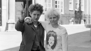 Punk rock group "Sex Pistols" manager Malcolm McLaren and friend designer Viviane Westwood seen here outside Bow Street Magistrate Court, after being remanded on bail for fighting. (