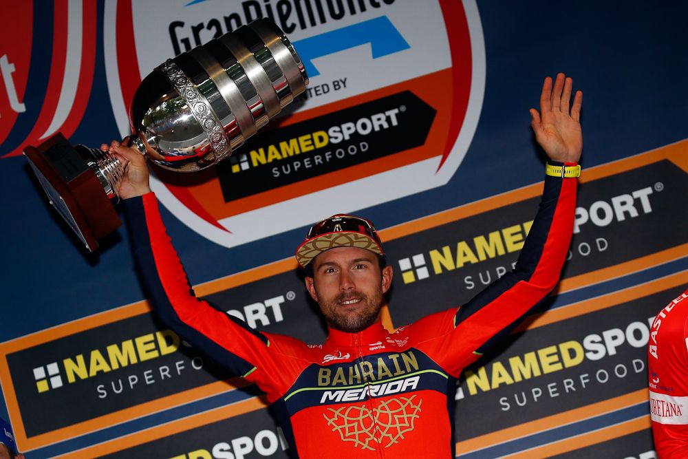Sonny Colbrelli celebrates his win on the Gran Piemonte podium