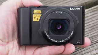 Panasonic Lumix LX15 / LX10 held in the palm of expert reviewer's hand