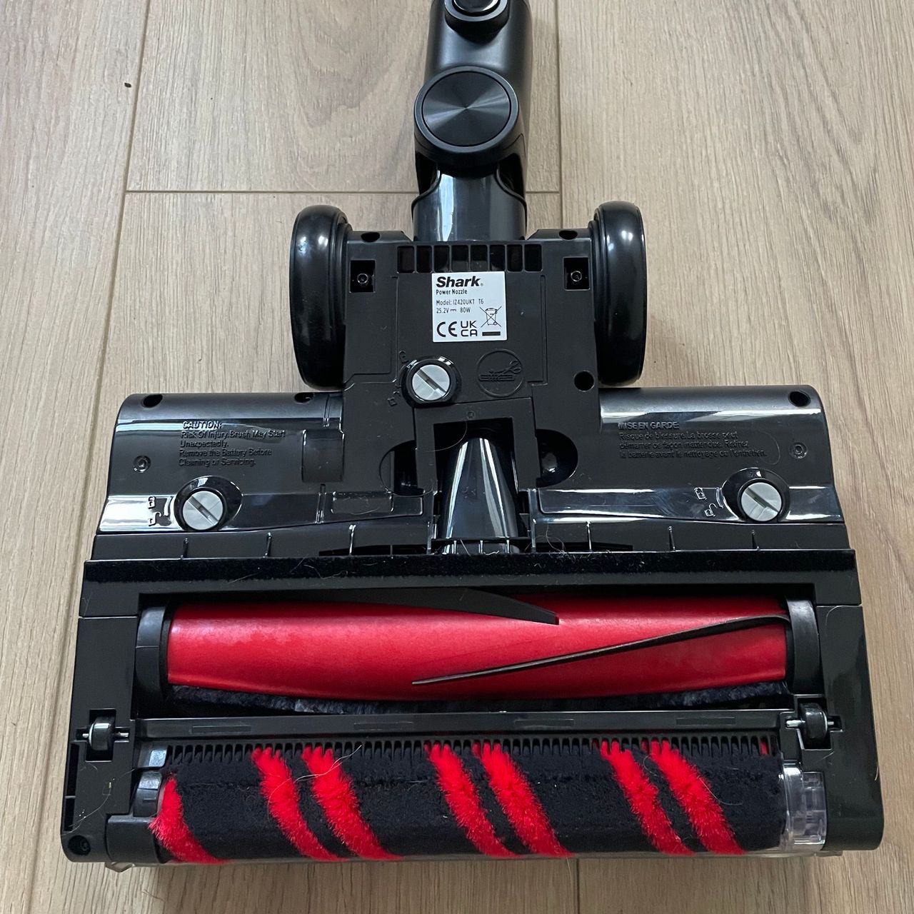 Upside down floorhead of the Shark Stratos Cordless Vacuum