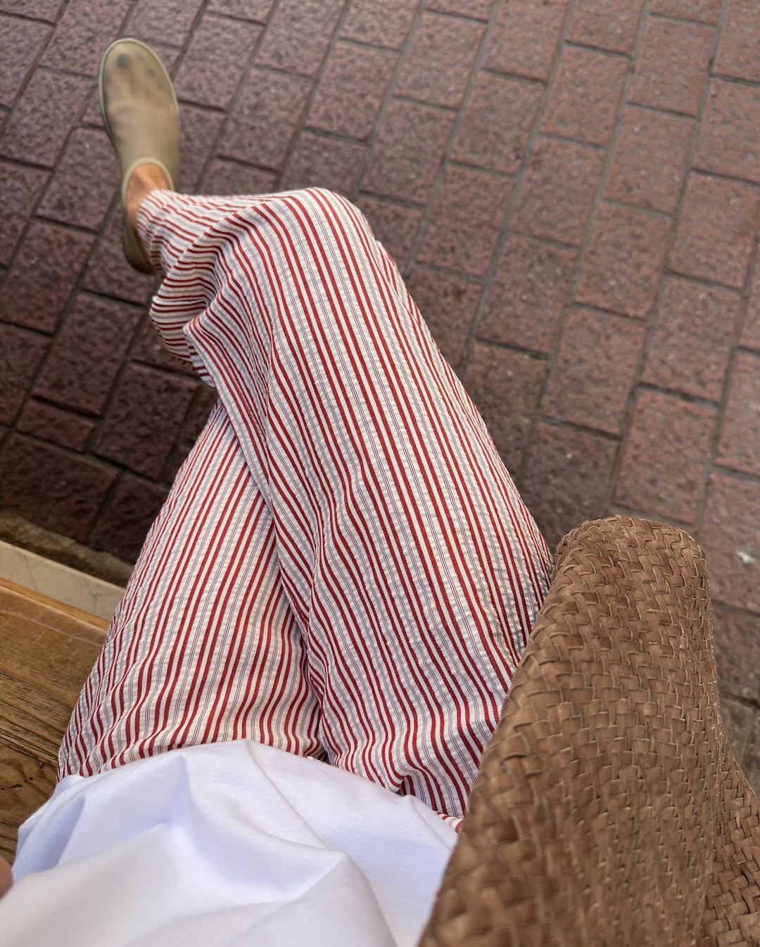 Marianne Smyth wearing stripy trousers and a dark pedicure with mesh shoes
