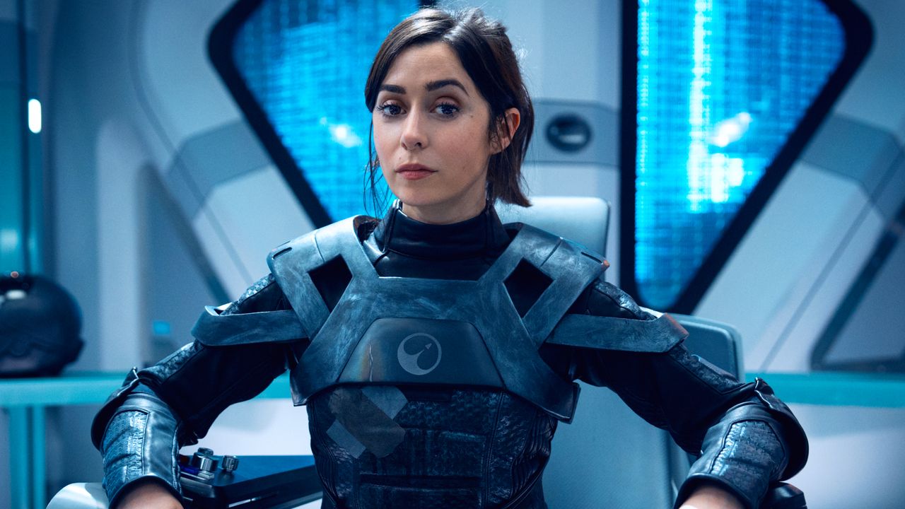 cristin millioti in a space suit sitting in a space ship in a still from black mirror