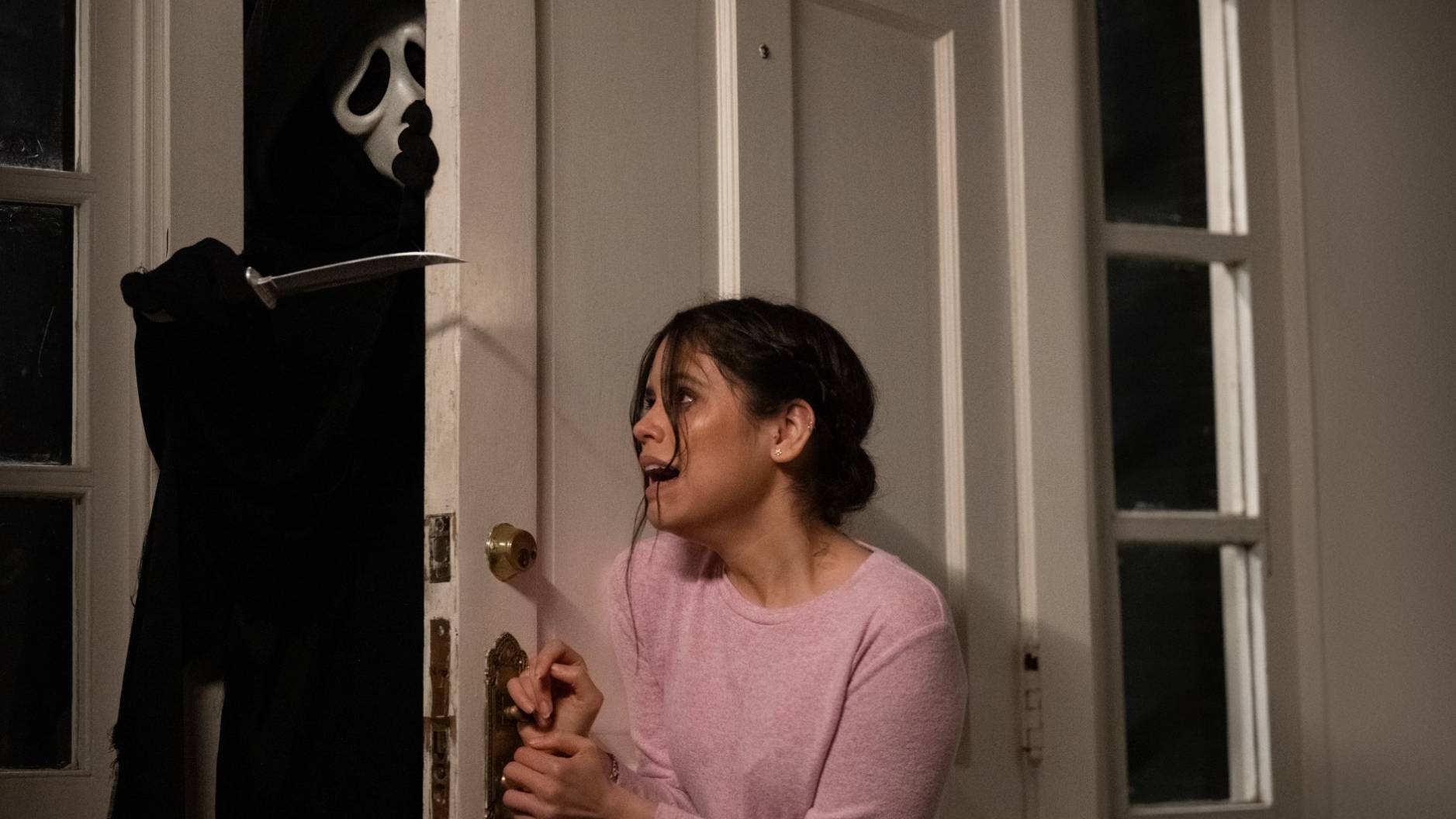 Jenna Ortega as Tara Carpenter being attacked by Ghostface in Scream (2022)