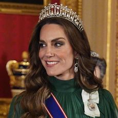 Princess Kate wearing a green gown and the Lover's Knot Tiara