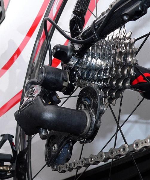 The Campagnolo electronic rear derailleur is chock full of carbon fiber and other composites.