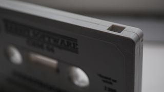 The record (write protect) tab on an audio cassette