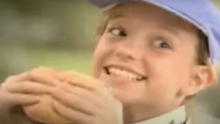 Britney Spears looking excited to eat a burger in Maull's BBQ sauce ad