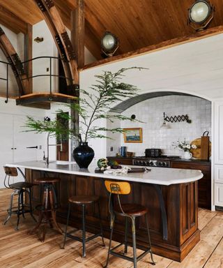 Rustic kitchen with white wall tiles