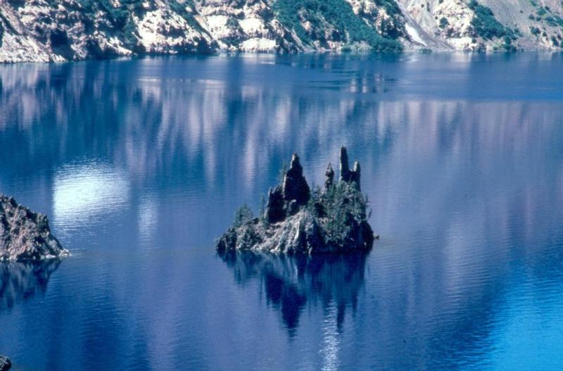 Gray andesite spires inspired this island&#39;s name, Phantom Ship.