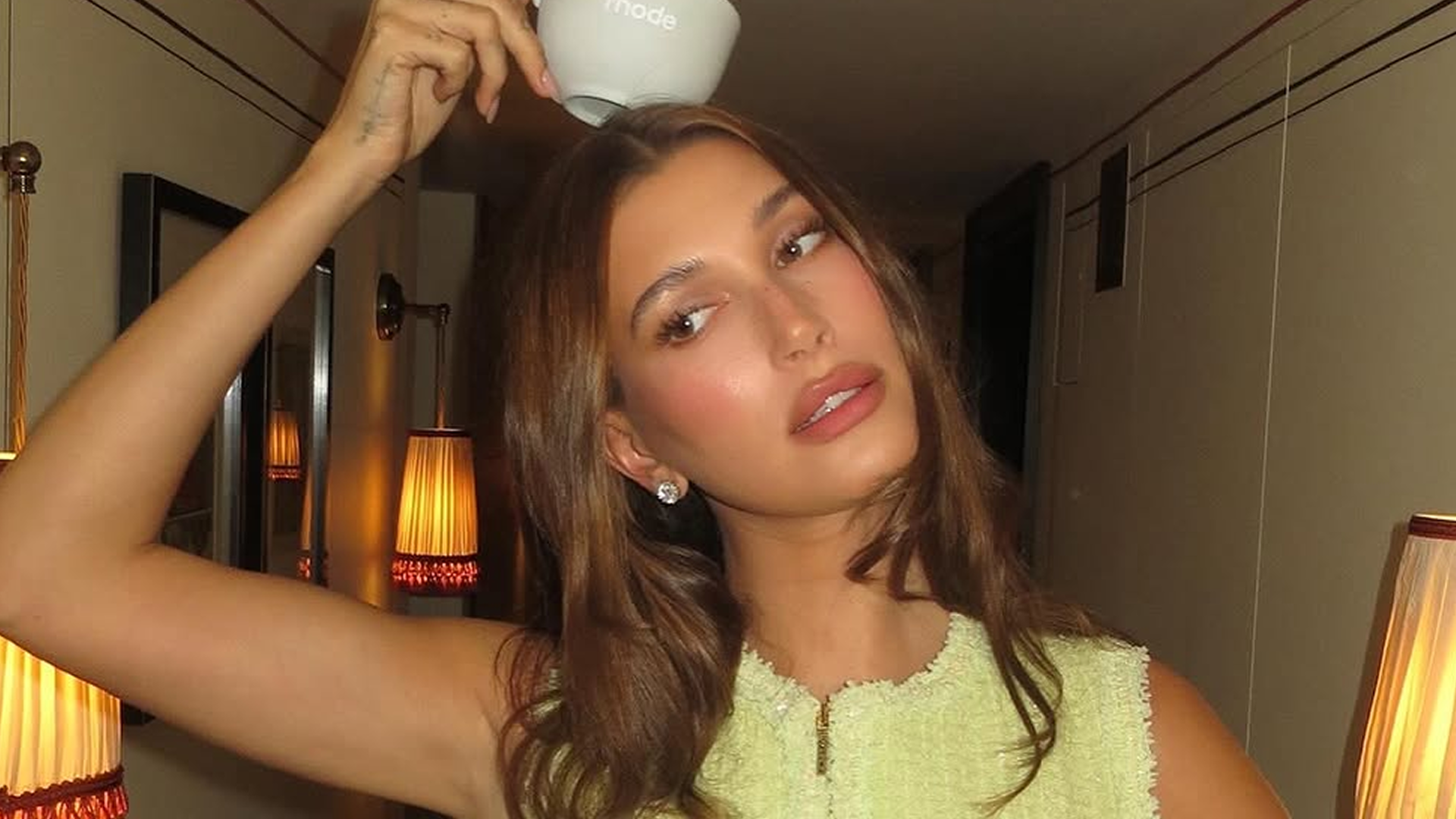 Hailey Bieber promoted Rhode in London wearing a lime green Chanel skirt set, which embodied a fall 2025 color trend