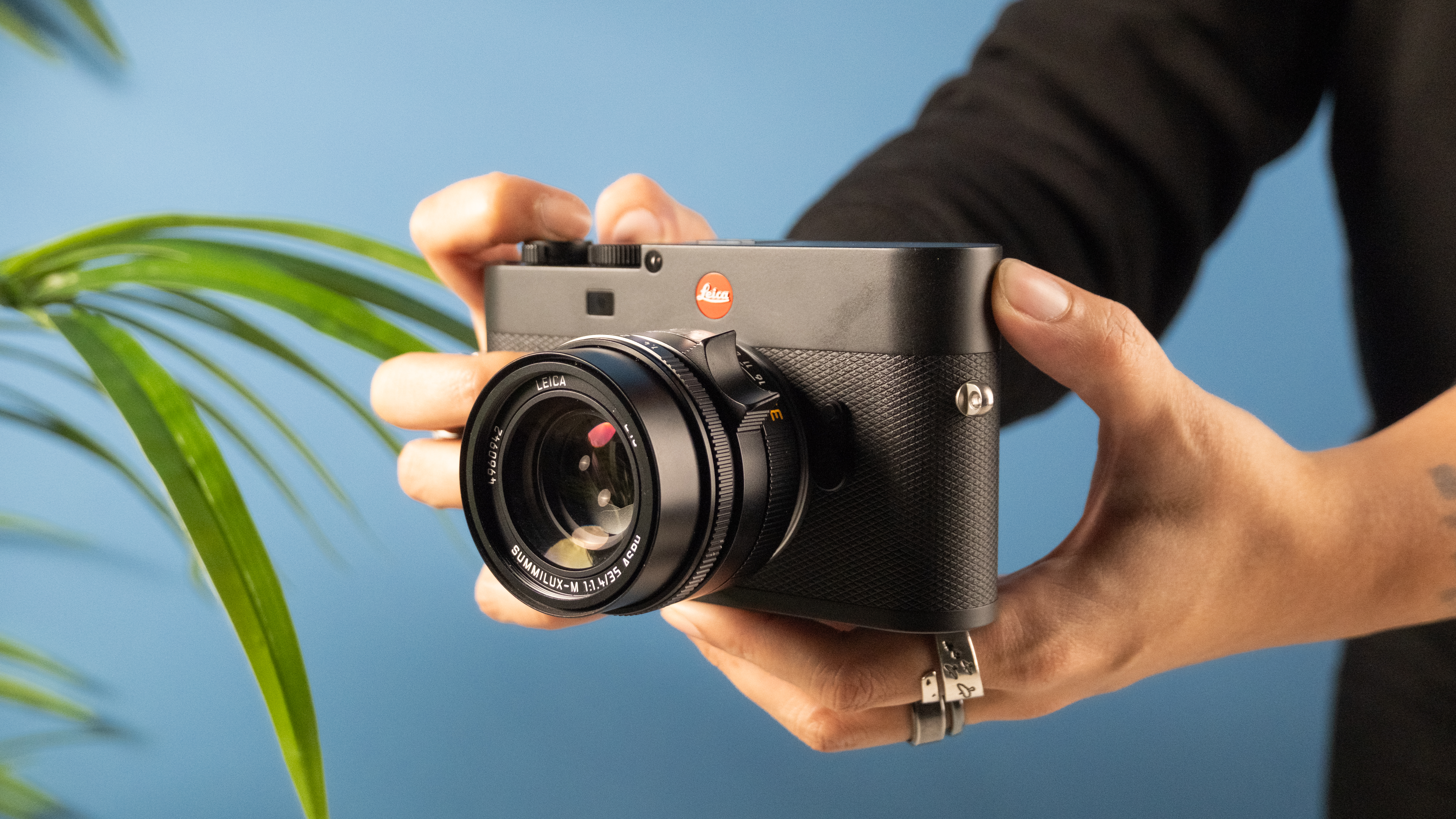 A black Leica M EV1 full frame mirrorless camera