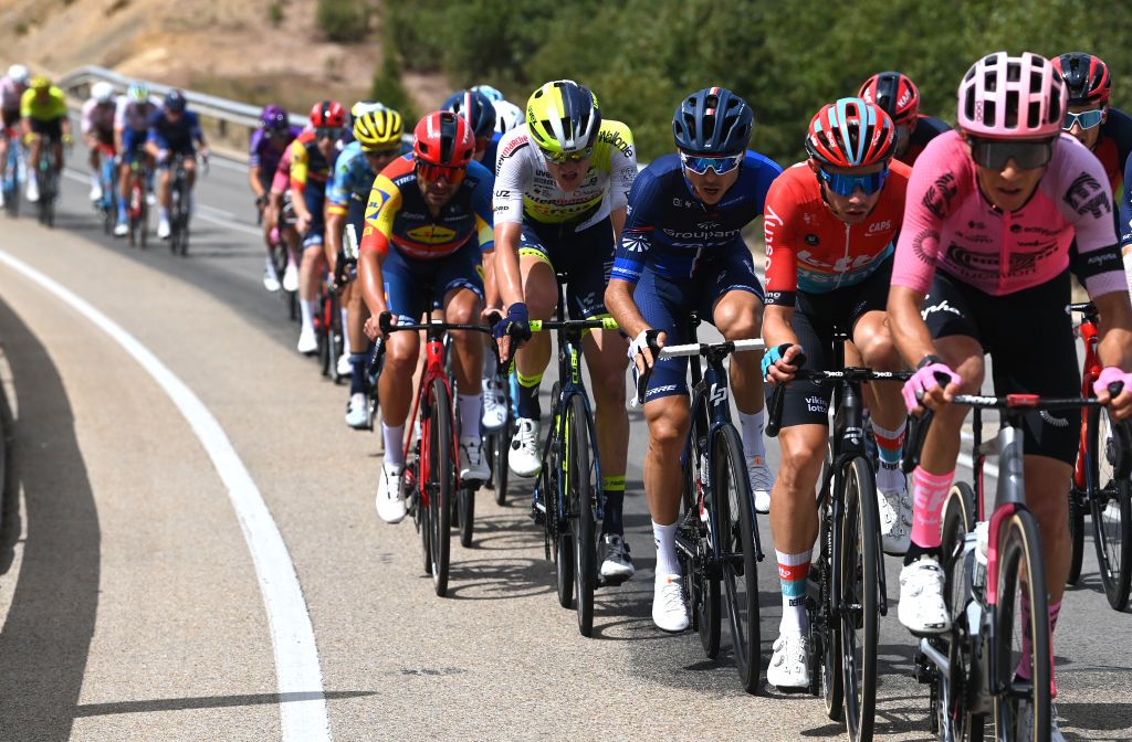 LA LAGUNA NEGRAVINUESA SPAIN SEPTEMBER 06 LR Alan Jousseaume of France and Team TotalEnergies Rudy Molard of France and Team Groupama FDJ and Andreas Kron of Denmark and Team Lotto Dstny compete in the breakaway during the 78th Tour of Spain 2023 Stage 11 a 1632km stage from Lerma to La Laguna Negra Vinuesa 1730m UCIWT on September 06 2023 in La Laguna NegraVinuesa Spain Photo by Tim de WaeleGetty Images