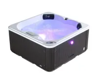 A hard-shell hot tub with a dark brow panelled exterior and white interior with purple LED lights