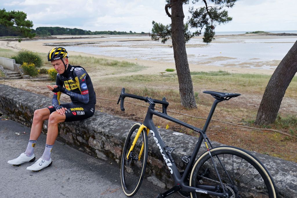 Team Jumbo Vismas Robert Gesink of Netherlands rests on a wall after crashing during the 3rd stage of the 108th edition of the Tour de France cycling race 182 km between Lorient and Pontivy on June 28 2021 Photo by Thomas SAMSON AFP Photo by THOMAS SAMSONAFP via Getty Images