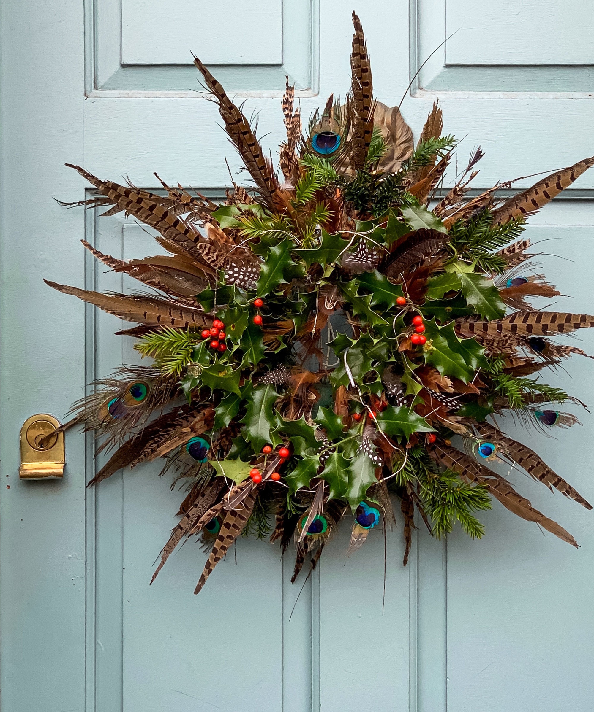 Feather and holly natural wreath