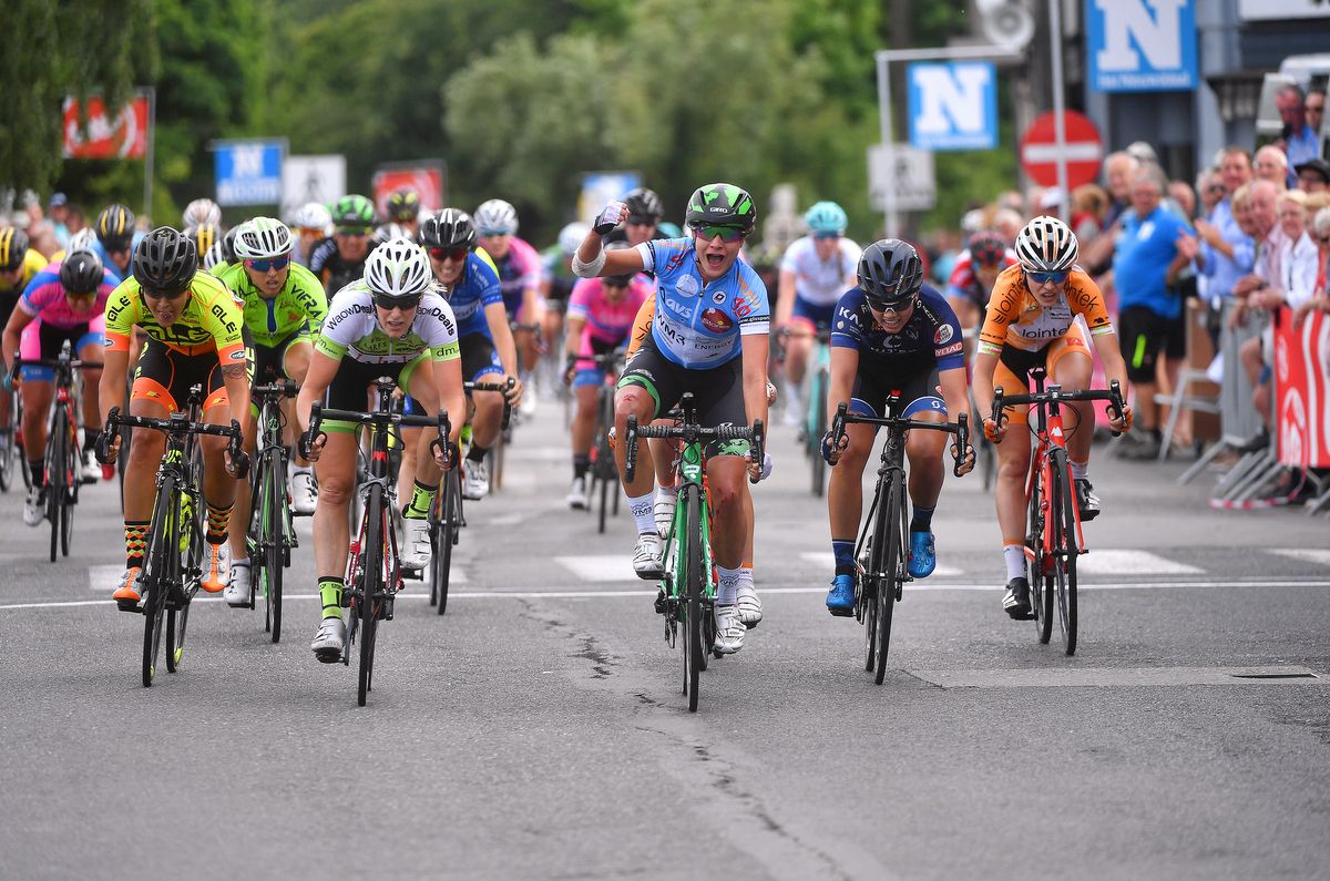 Marianne Vos (WM3 Pro Cycling) celebrates the win