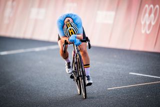 Belgian Lotte Kopecky hangs her head as she crosses the line in fourth in the Tokyo Olympics road race