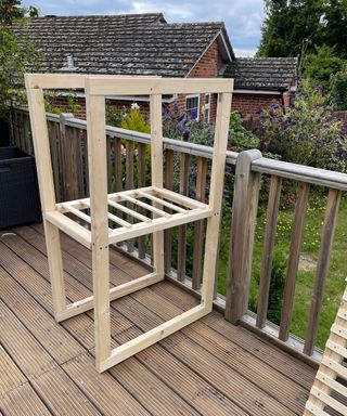 DIY wooden shelves in a garden