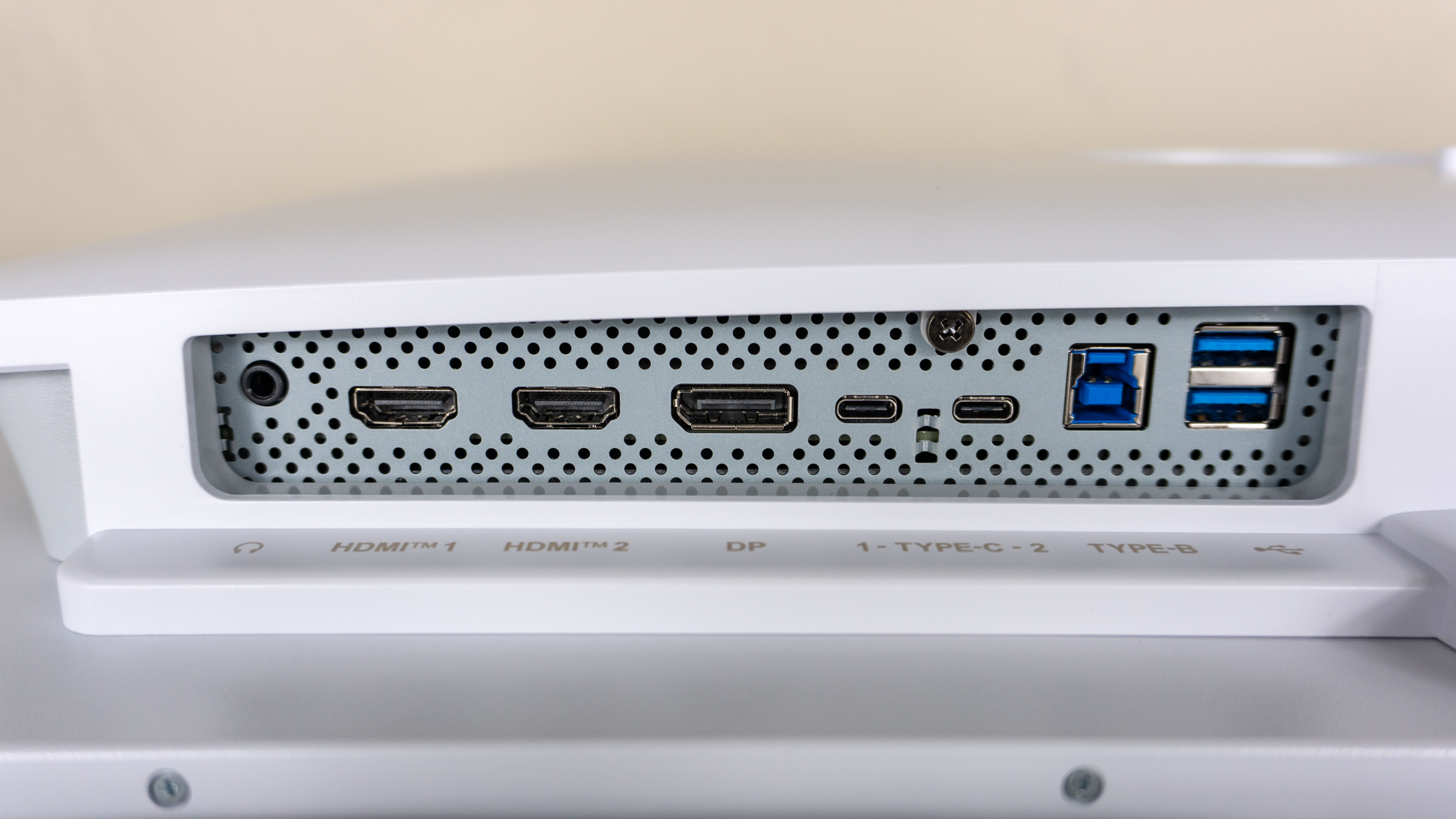 A close-up shot of the ports on the right underside of the MSI Pro Max 271UPXW12G monitor