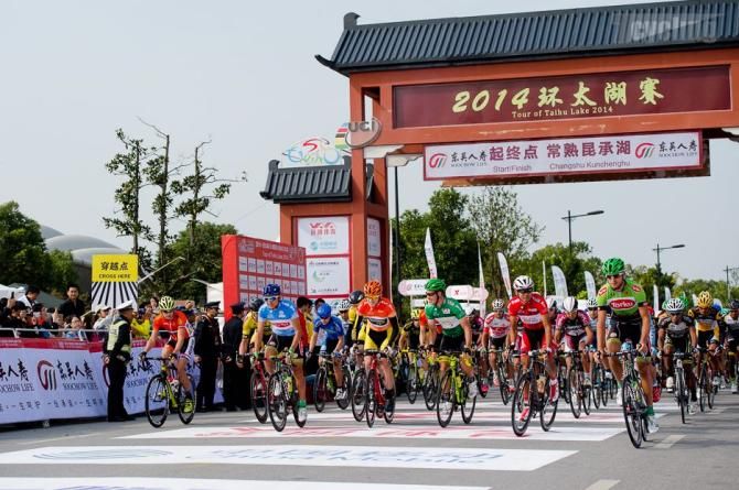 The riders depart for the day's stage