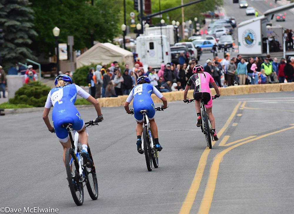 Maghalie Rochette (Luna) and Katerina Nash (Luna) riding behind Rose Grant with two laps to go